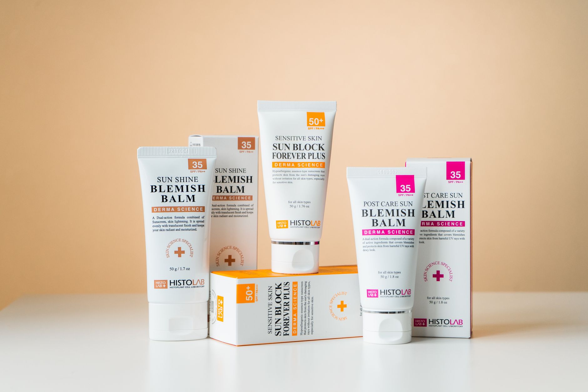 Various skin care products on a bathroom counter
